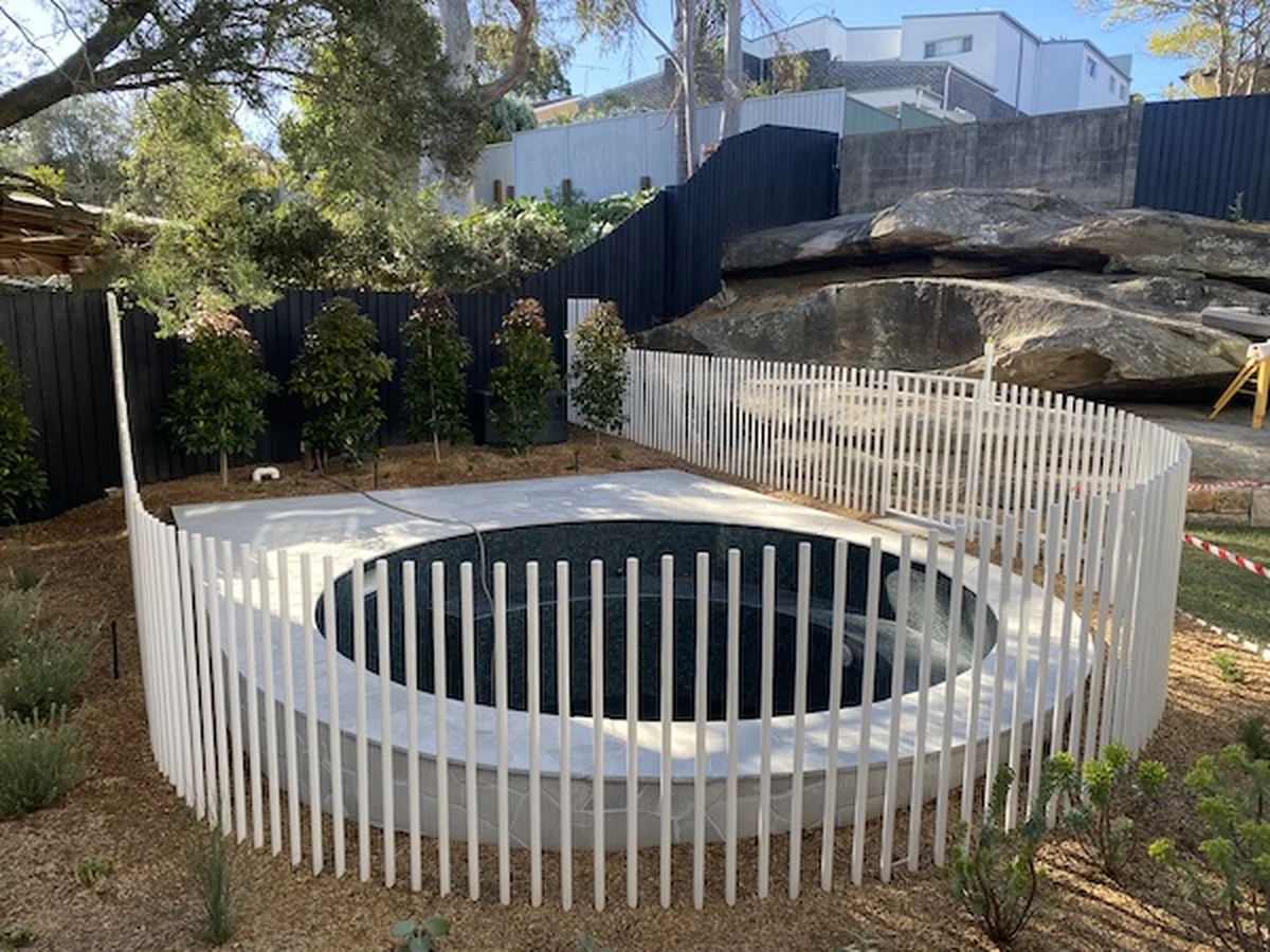 Custom round metal pool fence with modern design for Northern Beaches Sydney home - AS 1926 compliant residential fabrication by A&E Metal Craft